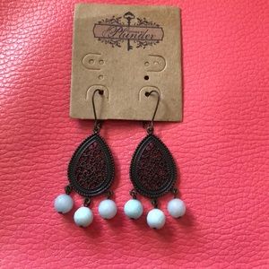 Plunder metal earrings with pale blue beads